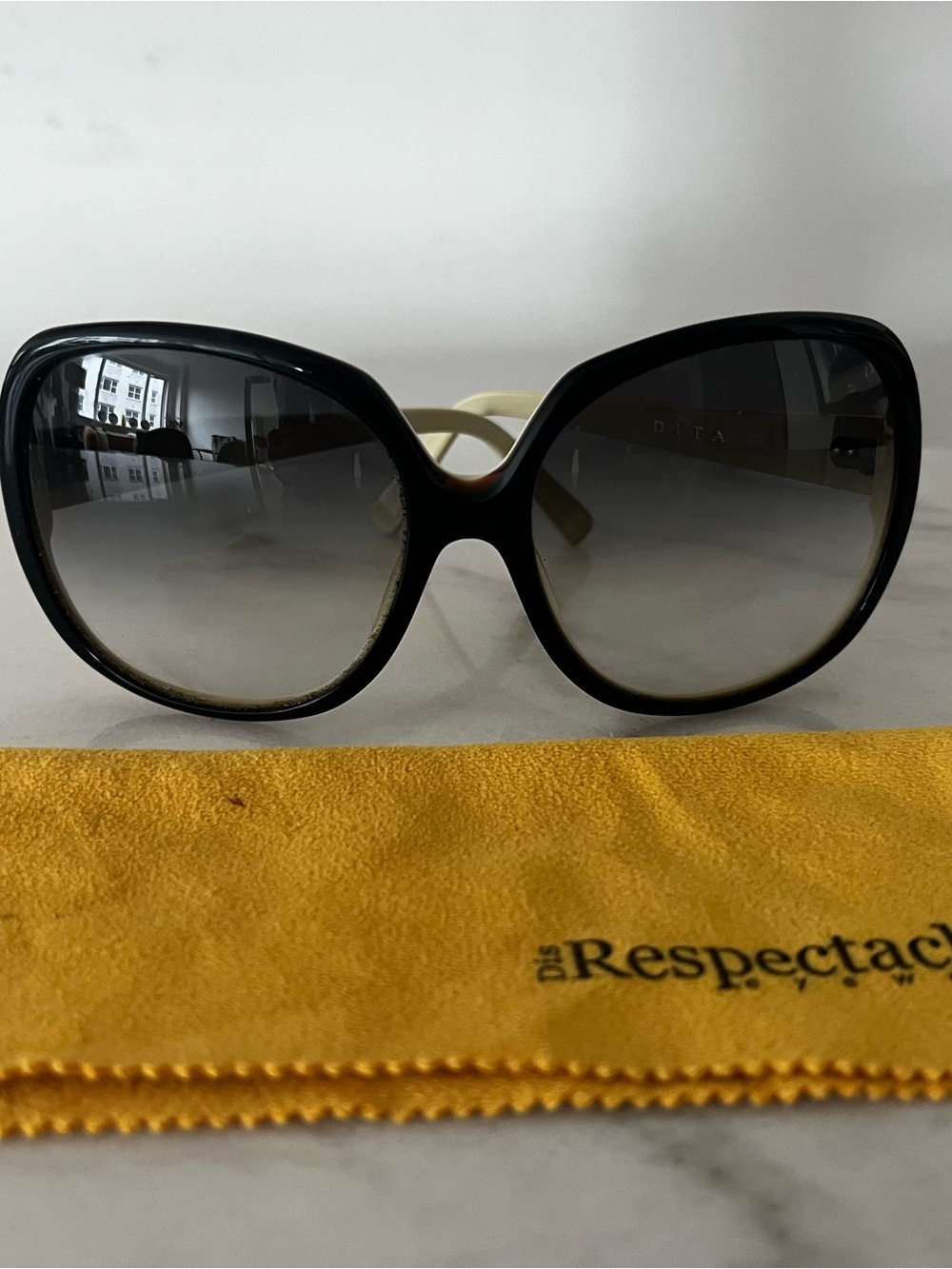 DITA Supa Dupa oversized round sunglasses black and cream